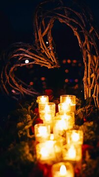 Candles Burning On The Grave At Night In The Cemetery vertical video