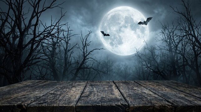 Old wood table and silhouette dead tree at night for Halloween background.