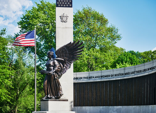 This bronze angel statue, sculpted by John F. Paramino in 1948, is part of the World War II Memorial located in Boston's Back Bay Fens, Boston, Massachusetts, New England, United States 
