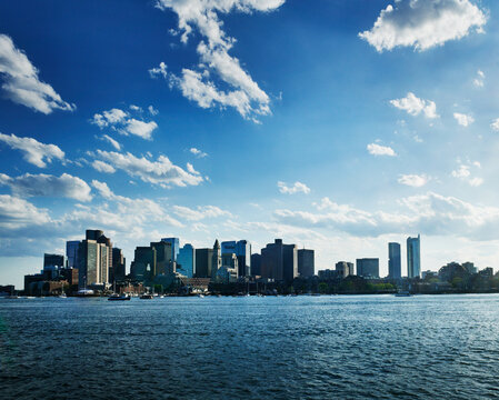 Scenic panoramic view of the Boston skyline and downtown financial district as viewed across the Boston Harbor., Boston, Massachusetts, New England, United States