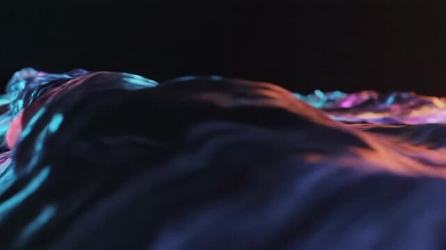 Abstract 3d render of liquid waves with vibrant neon blue, purple, and orange lighting effects