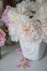 A bouquet of lush, delicate pink peonies © Olga Tkacheva