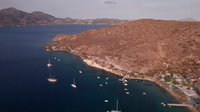Aerial view of secluded bay with sailboats near Parikia on Paros Island Greece
