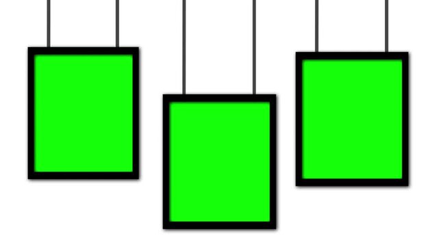 Three rectangular green screen signs drop down on strings and swing gently before pulling back up against a plain white background.