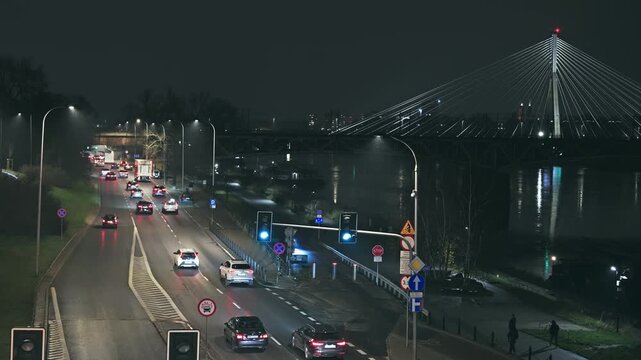 Warsaw Night Traffic on Vistula River with &Aring;&scaron;wi&Auml;&trade;tokrzyski Bridge