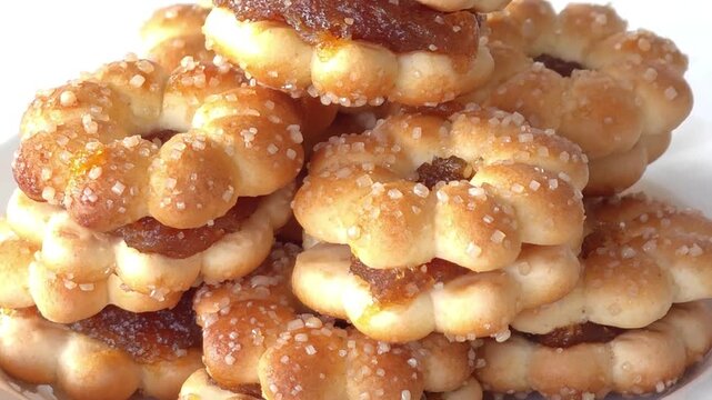 Bread with pineapple jam filling on a plate.