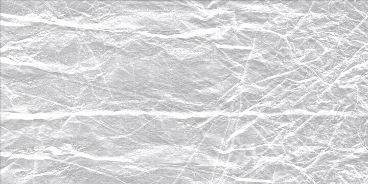 Crushed foil texture, shiny silver metallic background with abstract crumpled paper effect, bright surface.