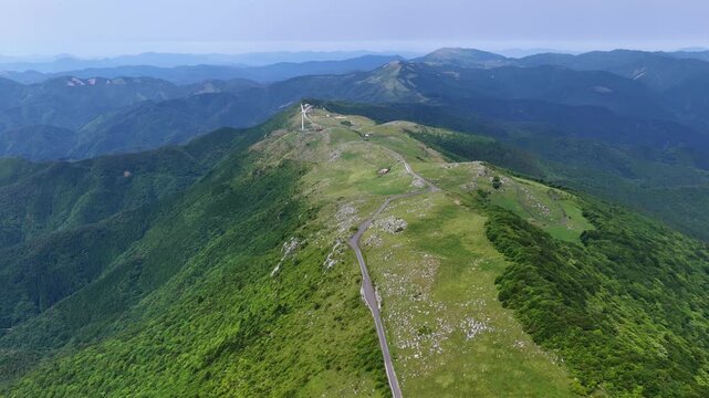 Aerial View of the Ridge Road and Wind Turbine at Shikoku Karst, Japan