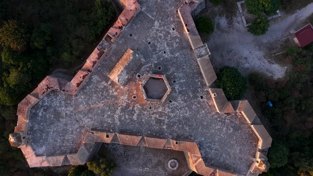 Aerial view of the historic Porto Palermo Castle with its unique triangular stone walls and hexagonal courtyard in Porto Palermo, Qarku i Vlores, Albania.
