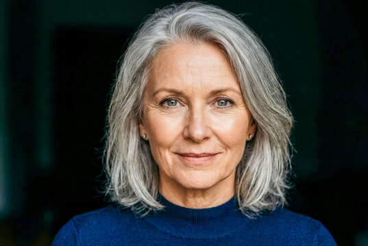 Elegant Mature Woman with Silver Hair and Serene Expression in Portrait
