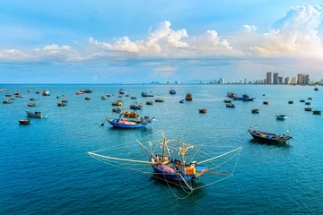 Fishing boats at My Khe Beach in Da Nang, Vietnam. © tawatchai1990