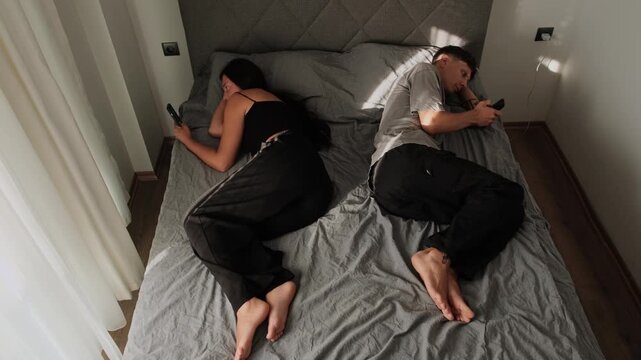 Digital disconnection. Couple spending time on smartphones instead of talking, modern relationship crisis, screen addiction, emotional neglect and social media dependence