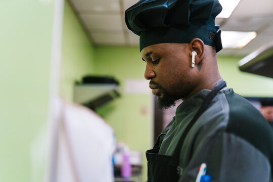 Focused Chef in Professional Kitchen