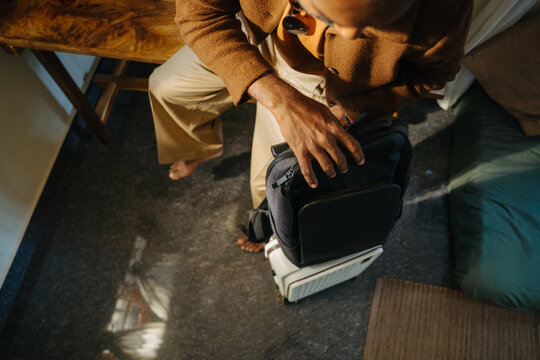 Traveler Packing Backpack on Suitcase