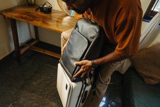 Traveler Stacking Backpack on Rolling Suitcase