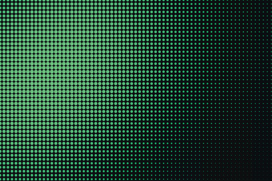 Green halftone pattern with gradient dots, fading from bright circles to a solid black background