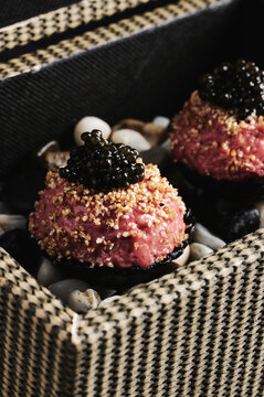Tartar balls with black caviar