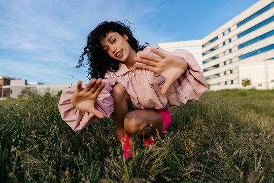 Woman posing in grass 