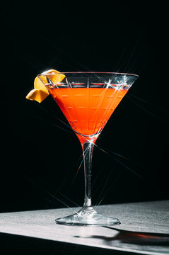 Red cocktail in Martini glass