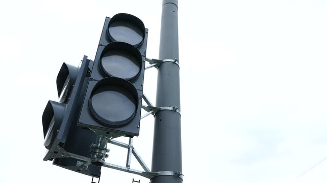 Traffic light signal installed on a city street, representing urban transportation infrastructure, road safety and modern traffic management systems