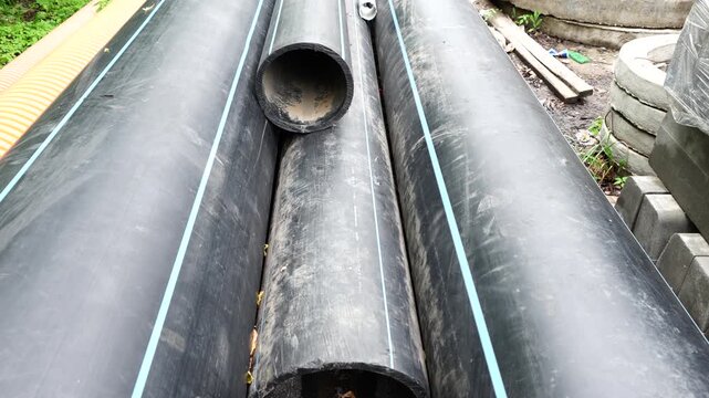 Large diameter drainage pipes at construction site used for sewer, stormwater and water infrastructure installation