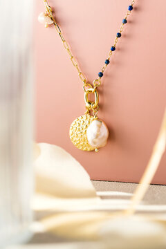 Gold Necklace with Hammered Coin Pendant and Baroque Pearl Accent