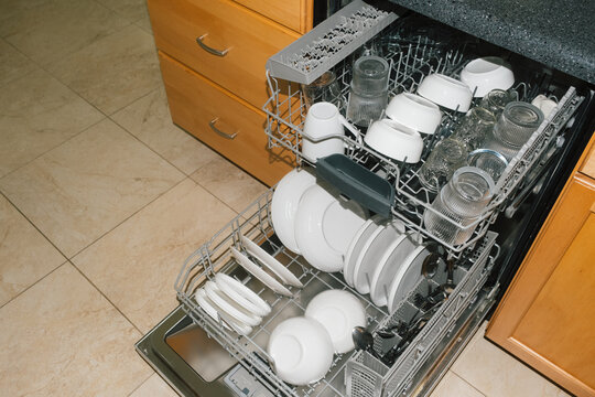 Dishwasher full of clean dishes home kitchen
