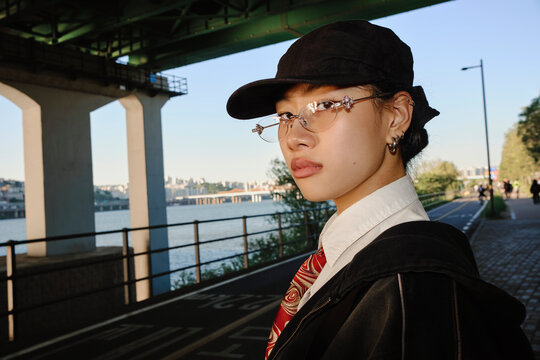 Fashionable young person posing near Hangang River in Seoul