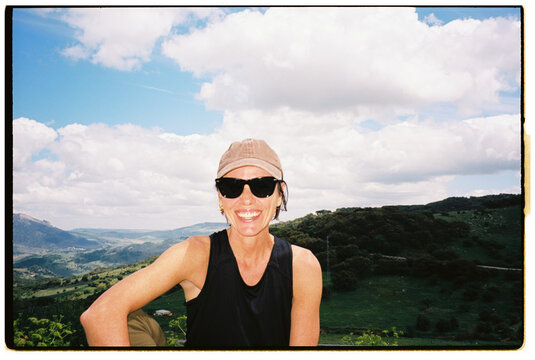 hiker against mountain landscape