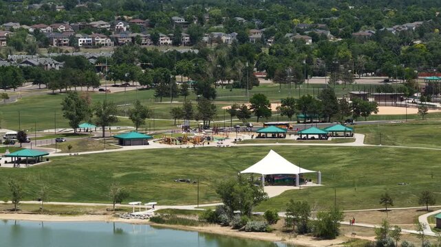 Aerial of Clement Park shelters and recreational fields in Littleton Colorado with baseball diamonds and Johnson Reservoir