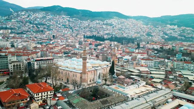 Bursa Ulu Cami mosque historical architecture captured from above with a drone flight. Aerial panoramic view of the grand landmark in Turkey.