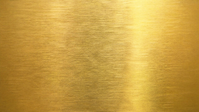 brushed gold metal texture background shiny golden metallic surface with smooth luxury sheen