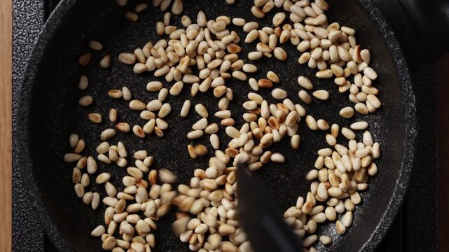 Toasting Pine Nuts Close Up Top View