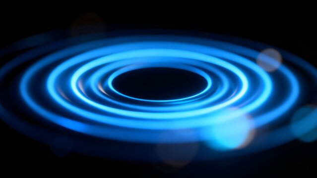 Blue concentric glowing rings on black