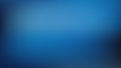 Obraz premium Abstract blue background with grainy texture and soft light gradient