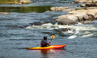 Naklejka premium kayaking in the river