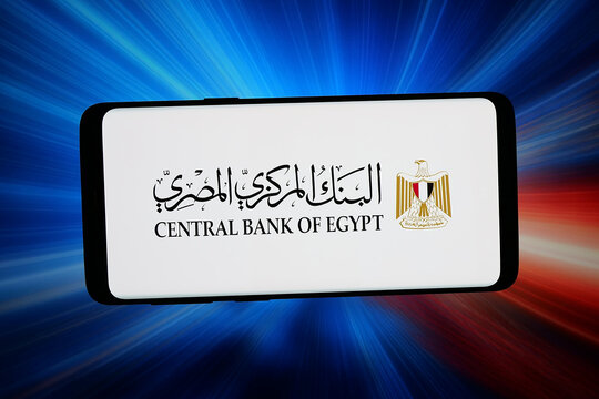 Stuttgart, Germany - 06-12-2026: In this photo illustration, the logo of monetary authority Central Bank of Egypt CBE is displayed on a smartphone in front of abstract background on computer screen.