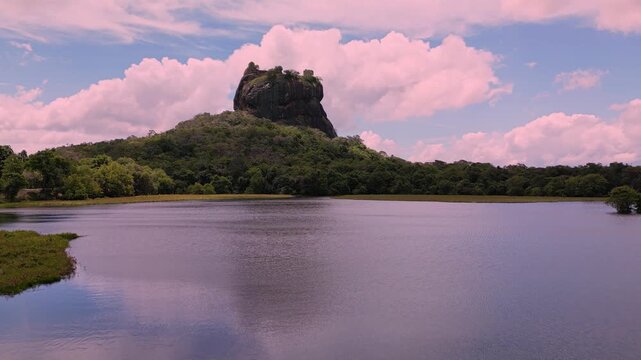 Breathtaking aerial drone view of Sigiriya rock fortress Sri Lanka from Sigiriya city UNESCO world heritage site natural colors footage Sri Lankan archaeological site