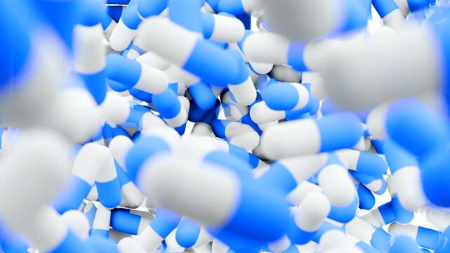 Blue and white capsules falling and filling the screen. 3D animation of medical pills. Pharmacy and healthcare concept.