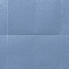 Fototapeta premium Textured blue paper background with copy space