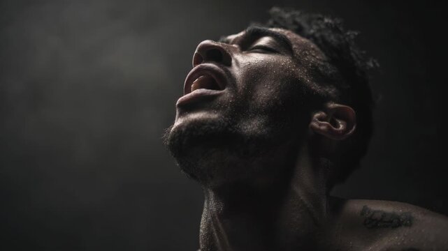 A man with a defeated expression after a loss.