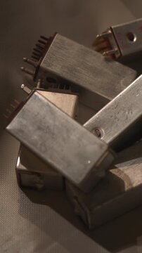 Transformer Parts Overview. Detailed Image Showcasing Transformer Elements In Disassembly Area . Media