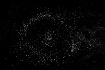 Fototapeta premium Natural concept of cosmos, crushed stones and dust isolated on black, clipping path 