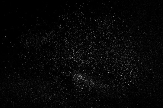 Natural concept of cosmos, crushed stones and dust isolated on black, clipping path
