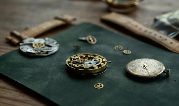 Traditional watchmaker workshop with vintage mechanical watches and tools