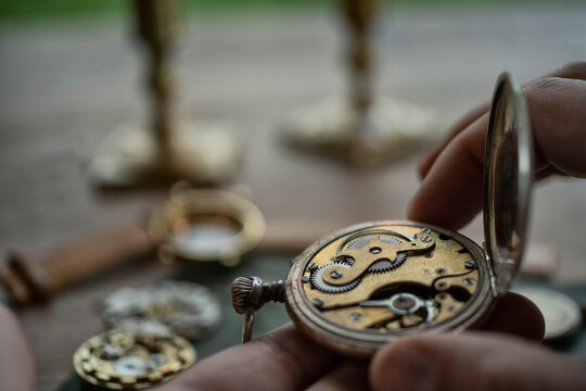 Traditional watchmaker workshop with vintage mechanical watches and tools