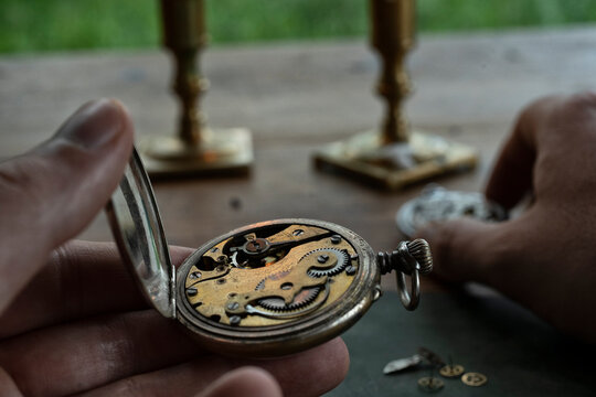 Traditional watchmaker workshop with vintage mechanical watches and tools