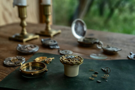 Traditional watchmaker workshop with vintage mechanical watches and tools
