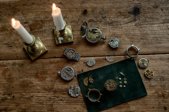 Traditional watchmaker workshop with vintage mechanical watches and tools