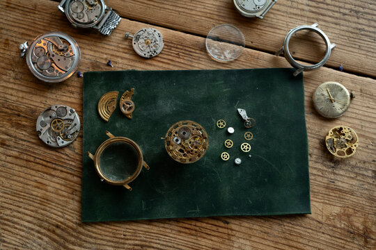 Traditional watchmaker workshop with vintage mechanical watches and tools